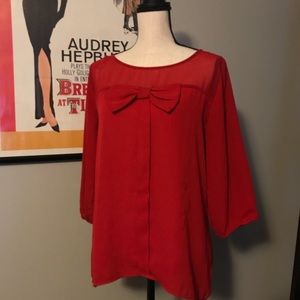 Great for Valentines! Cute sheer red top with bow!